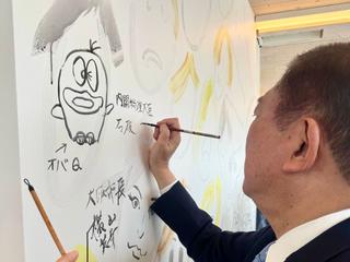 Drawing of Japanese Prime Minister Ishiba at the Czech National Pavilion, ©Daisue